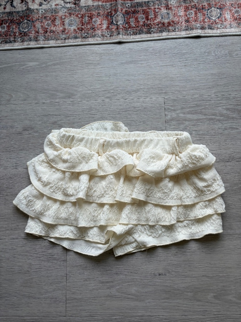 Beige frilly mini skirt